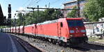 DB Cargo AG, Mainz [D] mit der Doppeltraktion  185 342-3  [NVR-Nummer: 91 80 6185 342-3 D-DB] +   185 309-2  [NVR-Nummer: 91 80 6185 309-2 D-DB] und einem innofreigt-Schüttgutwagenzug (leer) Richtung Hansa-Port im Hamburger Hafen am 20.05.25 Höhe Bahnhof Hamburg-Harburg.