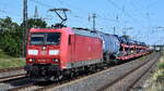 DB Cargo AG, Mainz [D] mit ihrer  185 057-7  [NVR-Nummer: 91 80 6185 057-7 D-DB] und einem gemischten Güterzug Richtung Rbf. Seddin am 12.08.25 Höhe Bahnhof Saarmund.