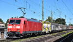 DB Cargo AG, Mainz [D] mit ihrer  185 161-7  [NVR-Nummer: 91 80 6185 161-7 D-DB] und einem gemischtem Güterzug am 24.09.25 Höhe Bahnhof Magdeburg-Neustadt.