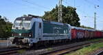 e.g.o.o. Eisenbahngesellschaft Ostfriesland-Oldenburg mbH, Aurich [D] mit ihrer Smartron  192 001  [NVR-Nummer: 91 80 6192 001-6 D-EGOO] und einem ganzzug polnischer Hochbordwagen mit Plane abgedeckt (Getreidetransport) aus Polen am 07.08.25 Höhe Bahnhof Magdeburg-Neustadt.
