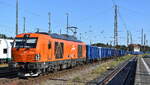 AMEH Trans - ArcelorMittal Eisenhüttenstadt Transport GmbH, Eisenhüttenstadt [D] mit ihrer Vectron Dual Lok  248 043  [NVR-Nummer: 90 80 2248 043-2 D-EKO] hat einem polnischen Ganzzug Drehgestell-Hochbordwagen mit Kohle/Koks von der Europabrücke hochgeholt u. wurde dann Richtung Ziltendorf/Eko umgesetzt am 26.08.25 Höhe Bahnhof Frankfurt/Oder.