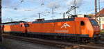 AMEH Trans - ArcelorMittal Eisenhüttenstadt Transport GmbH, Eisenhüttenstadt [D] mit der Doppeltraktion  145-CL 002  [NVR-Nummer: 91 80 6145 082-4 D-EKO] +  145-CL 203 /145 099-8   [NVR-Nummer: 91 80 6145 099-8 D-EKO] und dem Erzzug aus Hamburg Richtung EKO Ziltendorf am 29.10.25 Höhe Bahnhof Frankfurt/Oder.