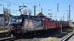 DB Cargo AG, Mainz [D] mit der Doppeltraktion  '193 318' [NVR-Nummer: 91 80 6193 318-3 D-DB] + '193 381' [NVR-Nummer: 91 80 6193 381-1 D-DB] und dem Erzzug aus Hamburg Richtung Ziltendorg EKO am 19.03.25 Höhe Bahnhof Frankfurt (Oder).