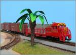 Unter Palmen zeigt sich mein Spur N Santa Fee Lok auf der im Bau befindlichen kleinen Anlage. 
Die Palme ist Eigenbau.

14. April 2025