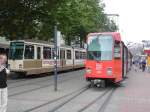 Zwei Doppeltraktionen aus Stadtbahnwagen N8C an der Haltestlle Kampstrae in Dortmund als Zge der Linie 403 nach Brackel und zum Westentor am 01.08.2003.