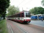 Eine Doppeltraktion aus Stadtbahnwagen B der Dsseldorfer Rheinbahn befhrt die Dsseldorfer Strae in Duisburg als Zug der Linie U79 nach Dsseldorf-Oberbilk am 02.06.2004.