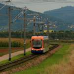 Wagen 142 auf dem Weg von Heddesheim nach Oggersheim kurz vor dem Vorort Mannheim-Wallstadt.