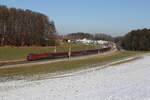 1116 243 aus Salzburg kommend am 19. Februar 2025 bei Axdorf im Chiemgau.