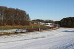 1116 233 'Saalbach' war am 19. Januar 2026 bei Axdorf einen 'Railjet' schiebend in Richtung Salzburg unterwegs.