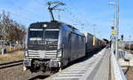 TX Logistik AG, Troisdorf [D] mit der geleasten Railpool Vectron '6193 124' [NVR-Nummer: 91 80 6193 124-5 D-Rpool] und einem KLV-Zug am 02.03.26 Durchfahrt Bahnhof Lutherstadt Wittenberg Hbf.