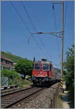 Die SBB Cargo Re 6/6 11646 (Re 620 064-6)  Bussigny  ist bei Ligerz mit einem Güterzug in Richtung Neuchâtel unterwegs. 

19. Juni 2025
