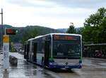 (276'259) - PostAuto Nordschweiz - BL 153'781/PID 12'422 - Mercedes (ex TPL Lugano Nr. 406) am 3. Juni 2025 beim Bahnhof Laufen