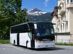 (275'943) - Hilrio, Schtz - LU 293'129 - Setra (ex Marti, Kallnach) am 29. Mai 2025 beim Bahnhof Grindelwald