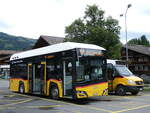 (276'283) - PostAuto Graubnden - GR 162'991/PID 12'081 - eSolaris am 5. Juni 2025 beim Bahnhof Gstaad