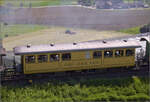 150 Jahre Emmentalbahn auf der angrenzenden  Bern-Luzern-Bahn .

Aus einem anderen Blickwinkel der Wagen Bi 523 'Sennhütte'. Tägertschi, Mai 2025.