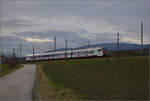 Flirt 3 RABe 523 101 'Le Day' bergwärts bei Arnex-sur-Orbe. Dezember 2025.